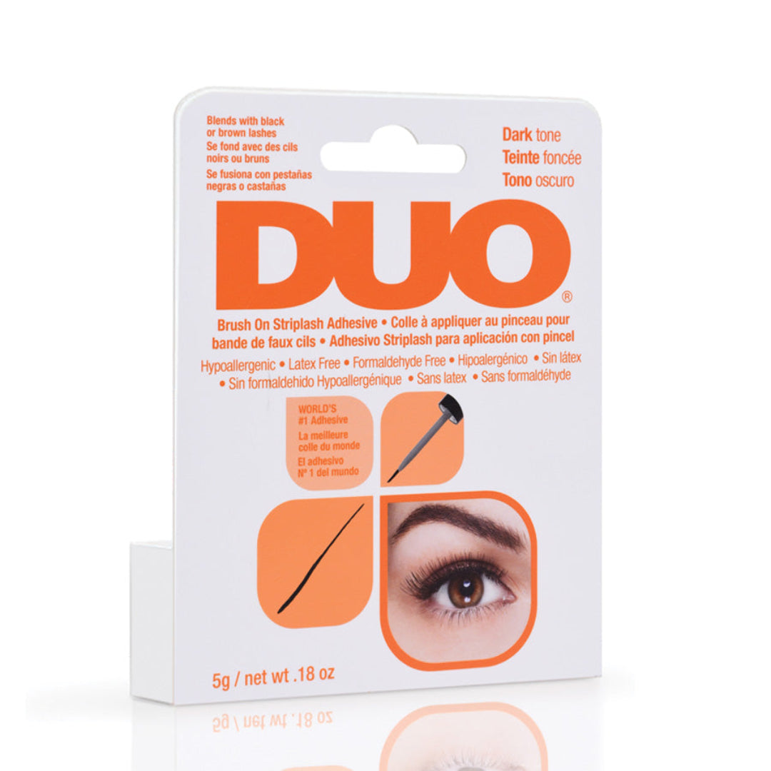 DUO Ardell Dark Tone Strip Lash Adhesvie in white packaging with orange branding on a white background