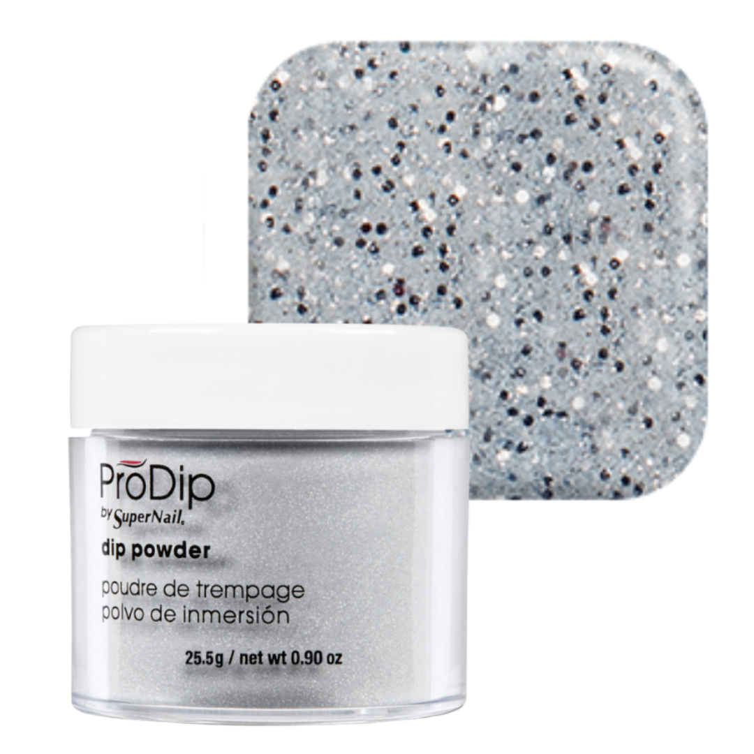 ProDip by SuperNail acrylic dipping powder in a clear jar with a white lid, shown in front of a square color swatch displaying the silver glitter powder texture.