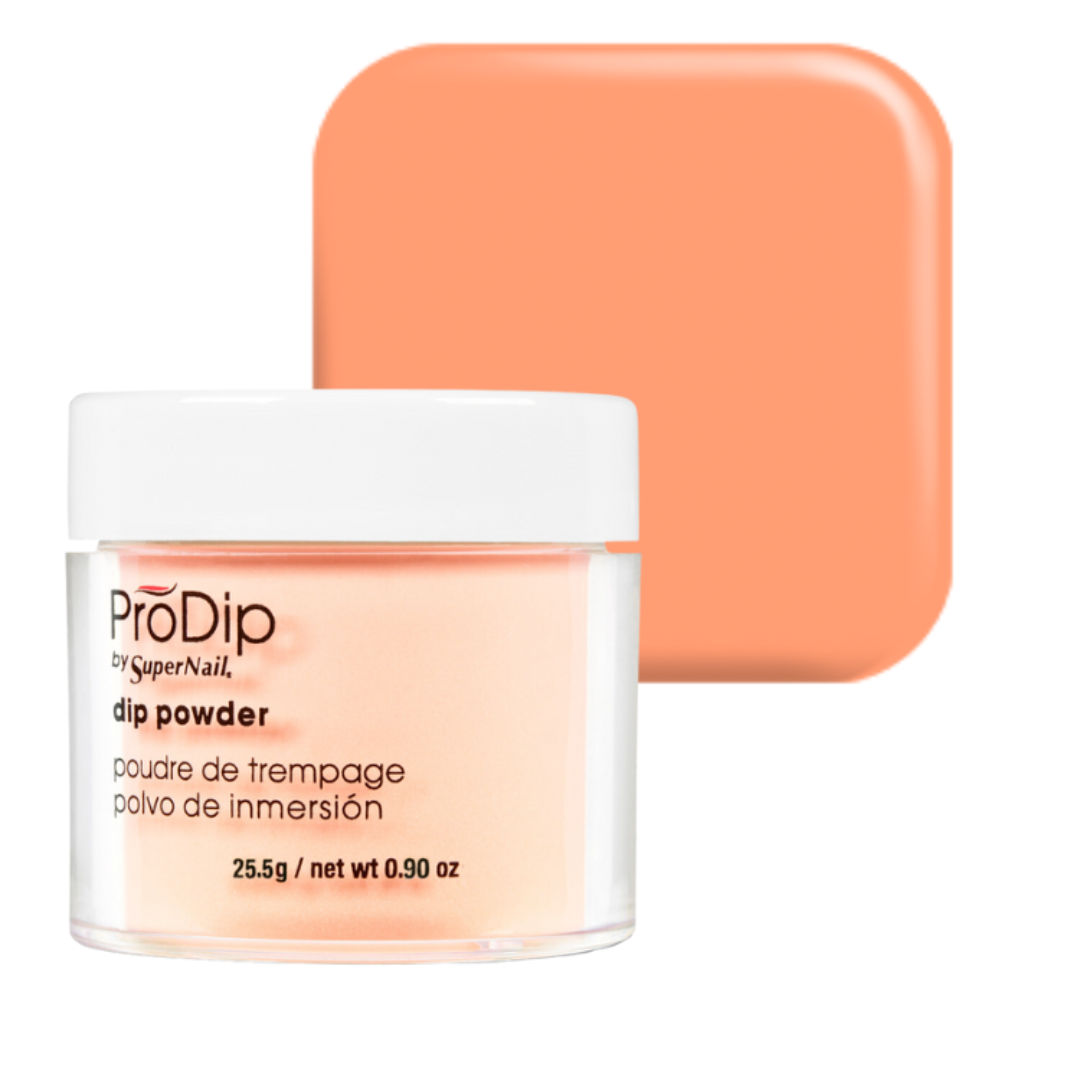 A jar of ProDip by SuperNail acrylic dipping powder in a peach-orange shade, shown in front of a matching square color swatch on a white background.