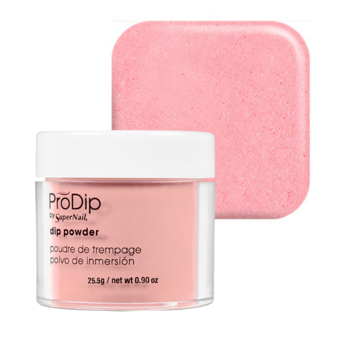 A jar of ProDip by SuperNail acrylic dipping powder in a light pink shade, shown in front of a matching square color swatch on a white background.