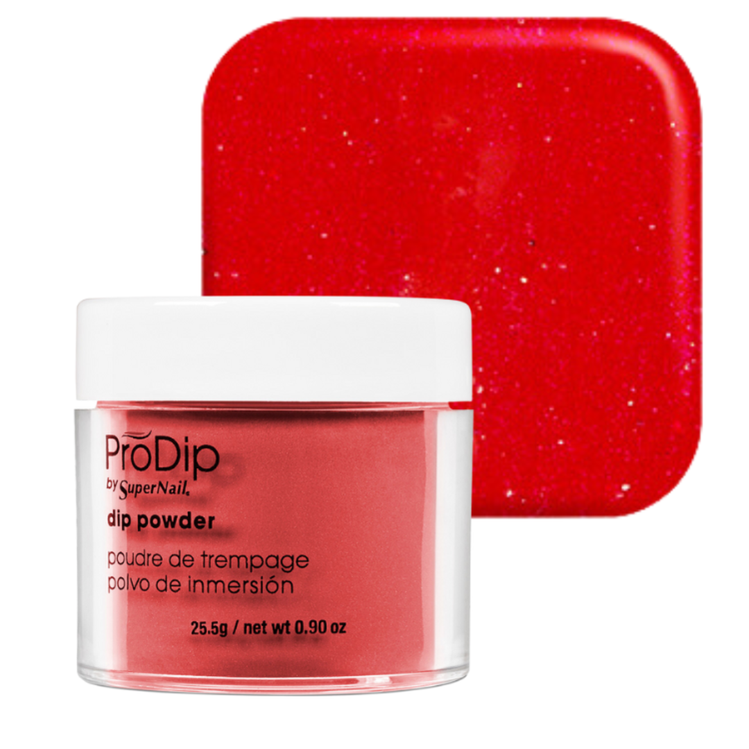 A jar of ProDip SuperNail acrylic dipping powder in a vibrant red glitter shade, shown in front of a matching square color swatch on a clean white background.