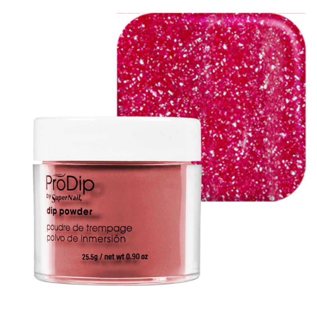 ProDip by SuperNail acrylic dipping powder in a clear jar with a white lid, shown alongside a square color swatch of sparkling hot pink glitter powder on a white background.