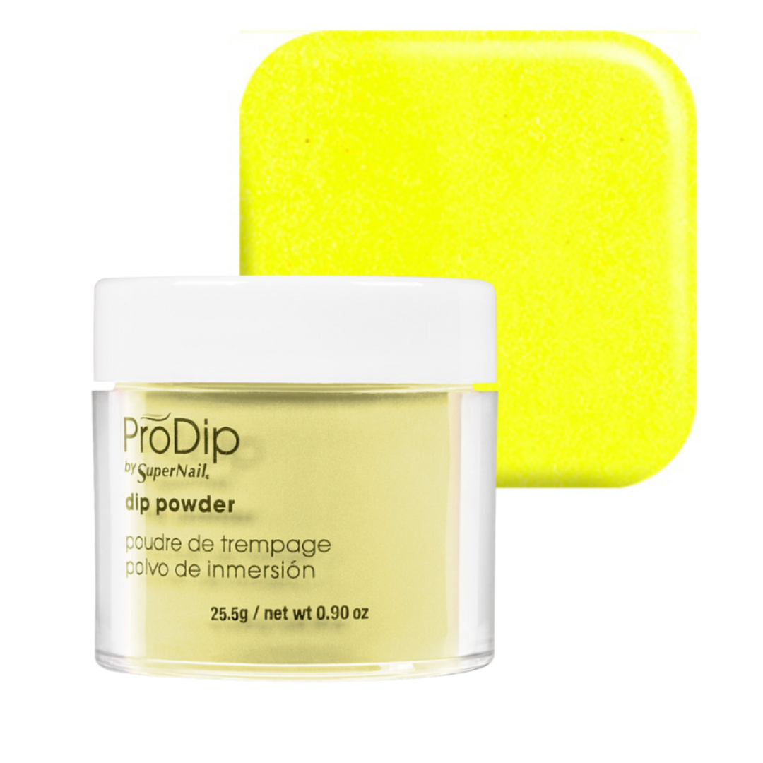 A jar of ProDip Dry SuperNail acrylic dipping powder with a white lid, shown in front of a bright neon yellow square swatch on a white background.
