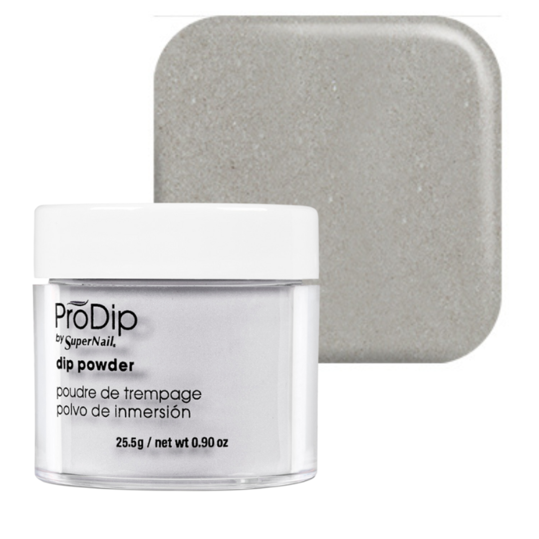 A jar of ProDip by SuperNail acrylic dipping powder in front of a square color swatch showing the glittery light gray shade of the powder.
