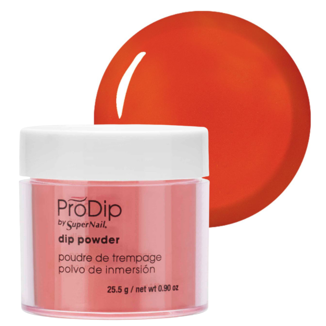 A jar of ProDip by SuperNail acrylic dipping powder in a vibrant orange shade, shown with a large circular color swatch behind it on a white background.