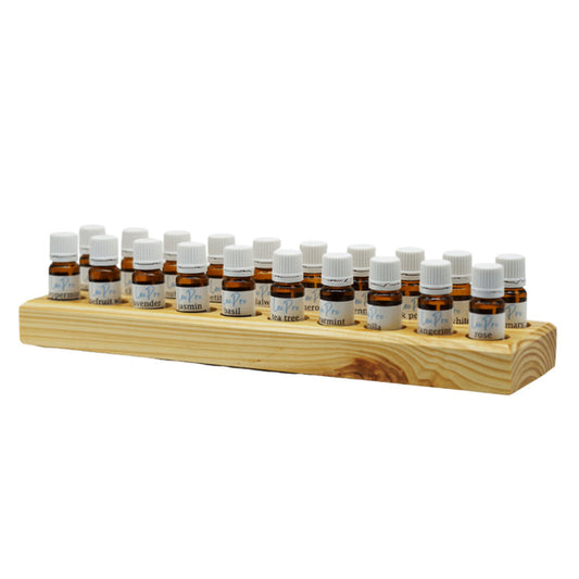 A wooden storage block with essential oils