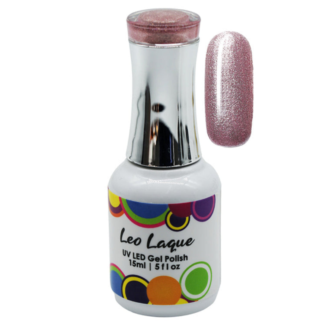 A bottle of Leo Laque UV LED gel nail polish with a metallic pink glitter shade, shown alongside a vertical nail tip swatch displaying the shimmering finish.