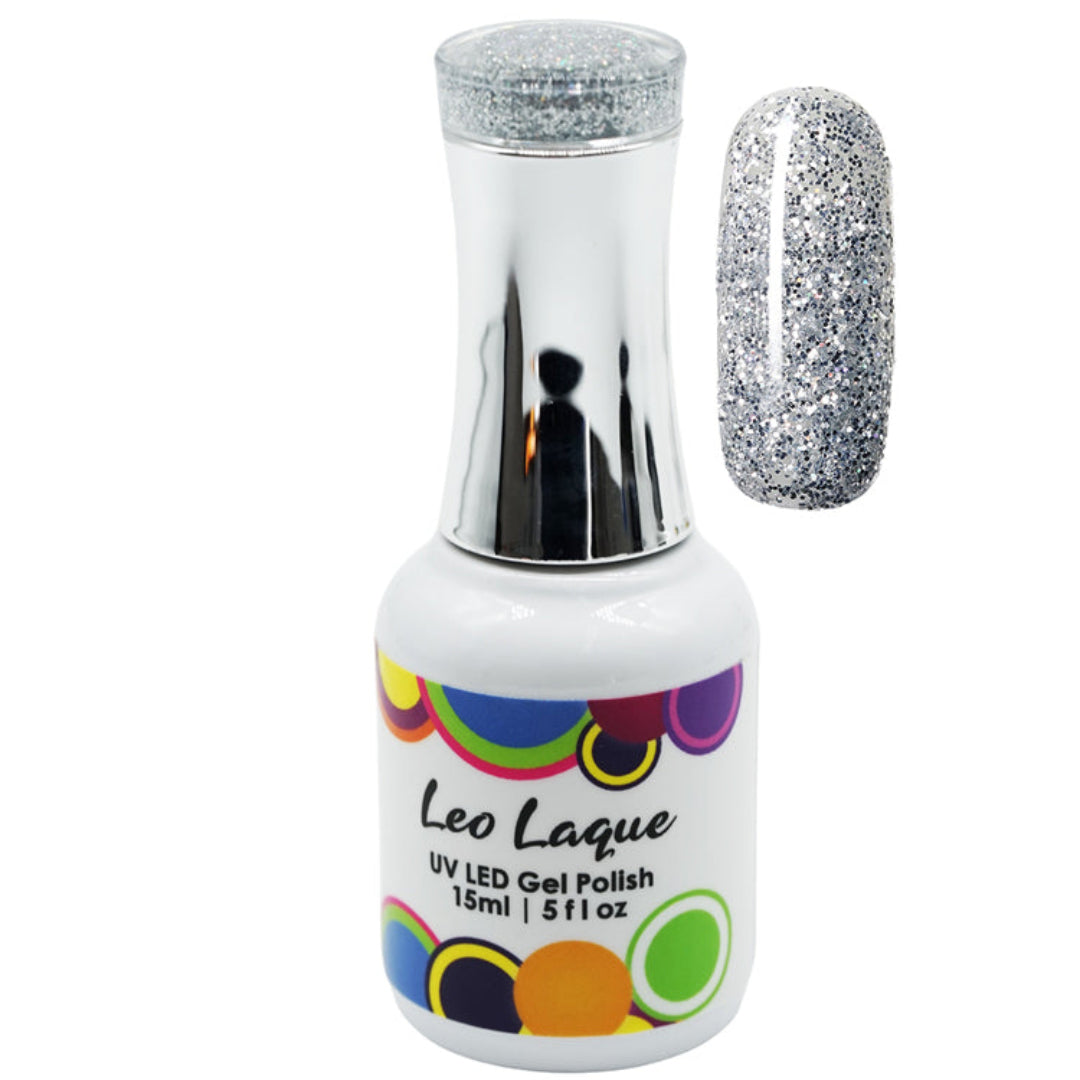 A bottle of Leo Laque UV LED gel polish with a silver glitter polish, shown alongside a nail swatch displaying the silver glitter finish.