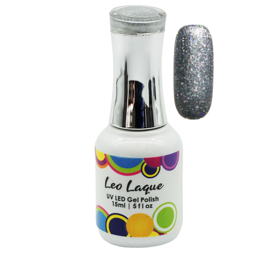A bottle of Leo Laque UV LED gel polish with a silver glitter polish, shown alongside a vertical nail swatch displaying the sparkling silver-gray color.
