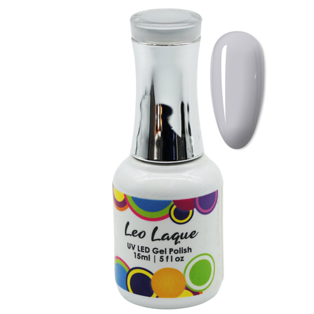 A bottle of Leo Laque UV LED Gel Polish with a silver cap and a white base, shown next to a swatch of the light gray polish on a white background.