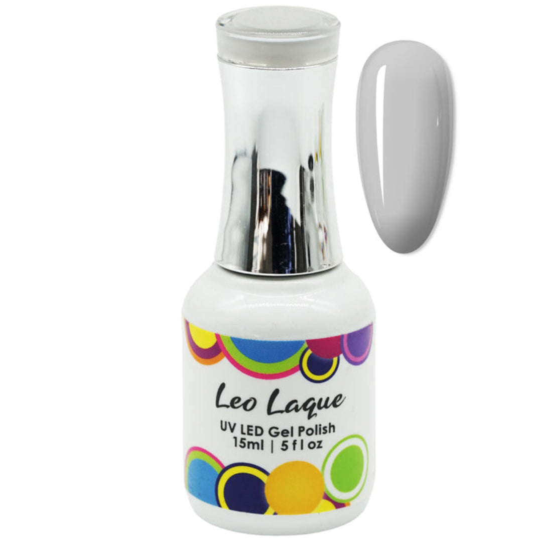 A bottle of Leo Laque UV LED Gel Polish with a clear cap and a white bottle, shown next to a glossy white nail swatch on a plain white background.