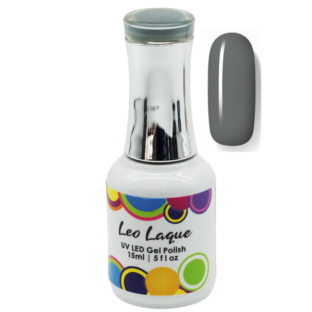 A bottle of Leo Laque UV LED Gel Polish with a silver cap and a swatch of the gray polish shown next to it on a white background.