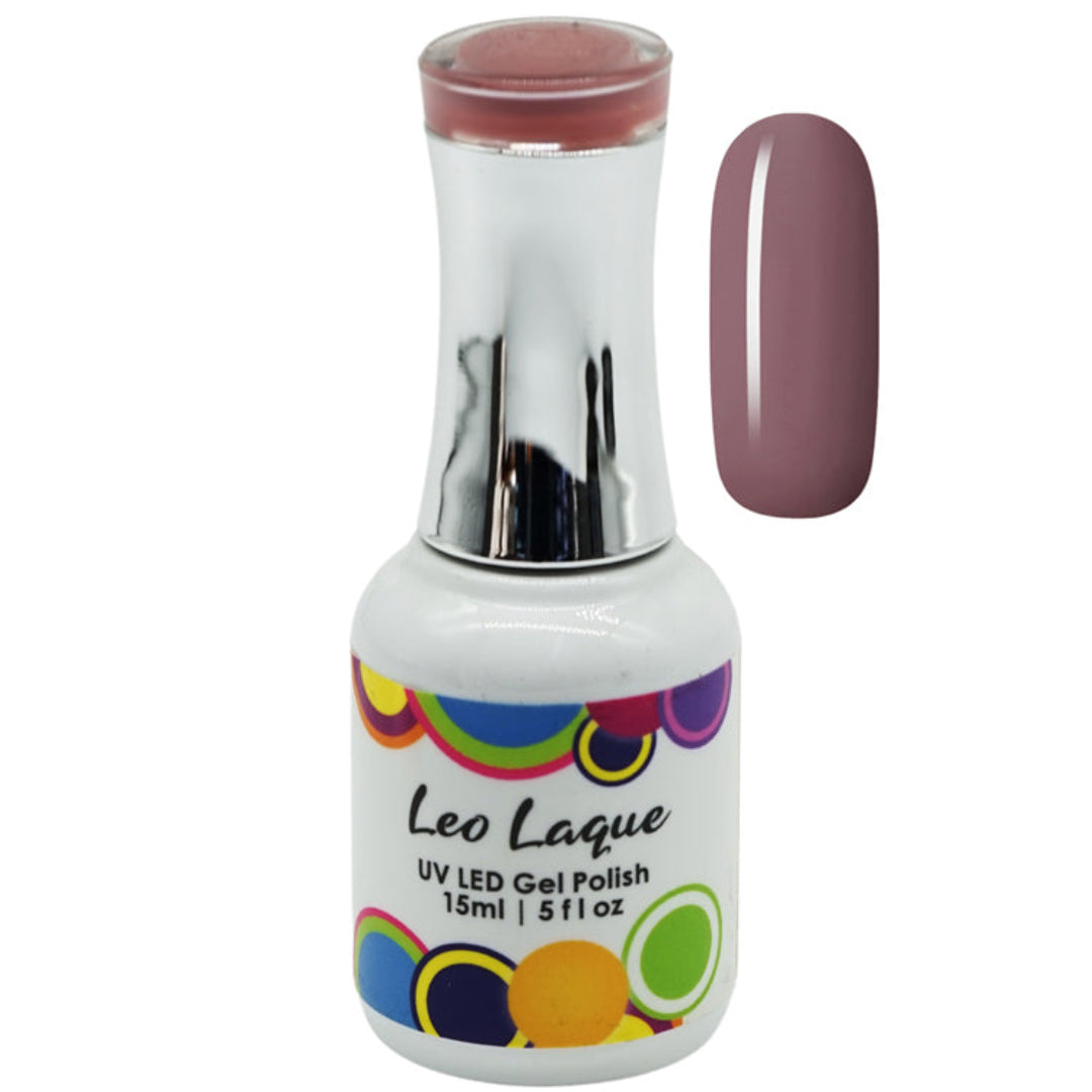 A bottle of Leo Laque UV LED Gel Polish with a silver neck and a white label featuring colorful dots, shown next to a vertical swatch of the mauve-pink polish color on a white background.