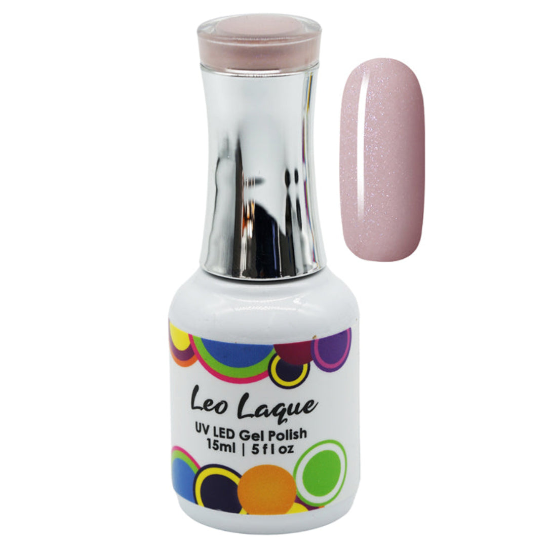 A bottle of Leo Laque UV LED Gel Polish next to a nail color swatch showing the glittery light pink shade.