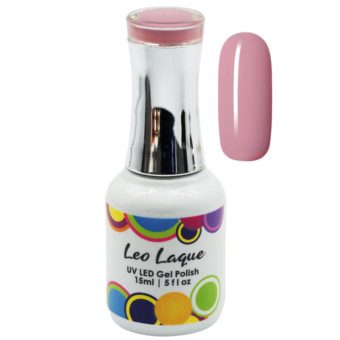 A bottle of Leo Laque UV LED gel nail polish with a white label, colorful circular pattern, and a metallic silver cap, shown next to a vertical swatch of the pink polish on a white background.