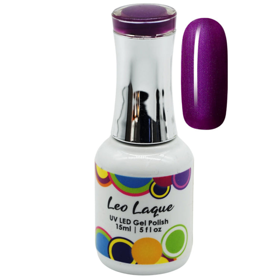 A bottle of Leo Laque UV LED gel polish in a deep metallic purple shade, shown next to a vertical nail swatch displaying the same glittery purple color. The bottle has a white base, a shiny silver neck, and a purple cap, with a colorful pattern of overlapping circles on the label.