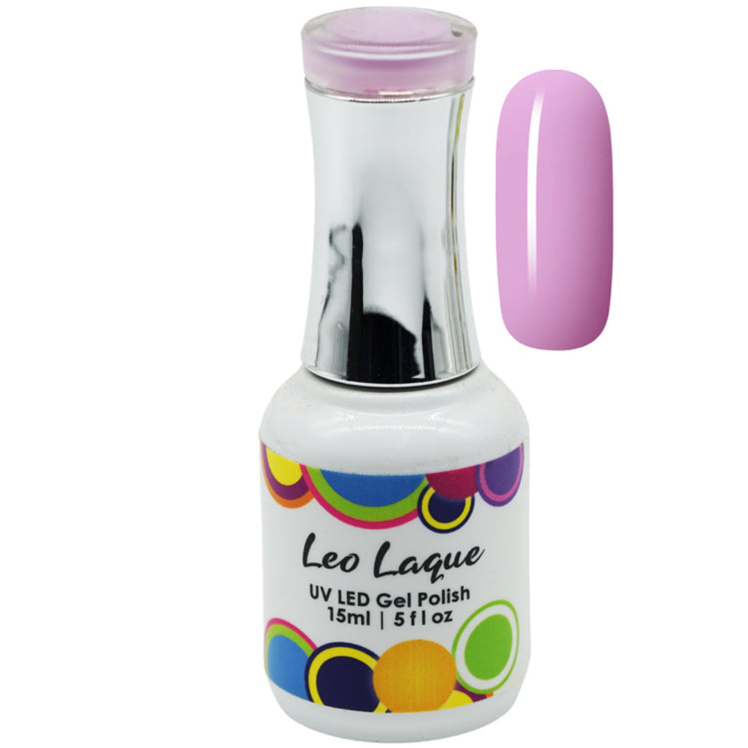 A bottle of Leo Laque UV LED gel polish in a light pastel pink shade, shown alongside a matching pink nail swatch on a plain white background.