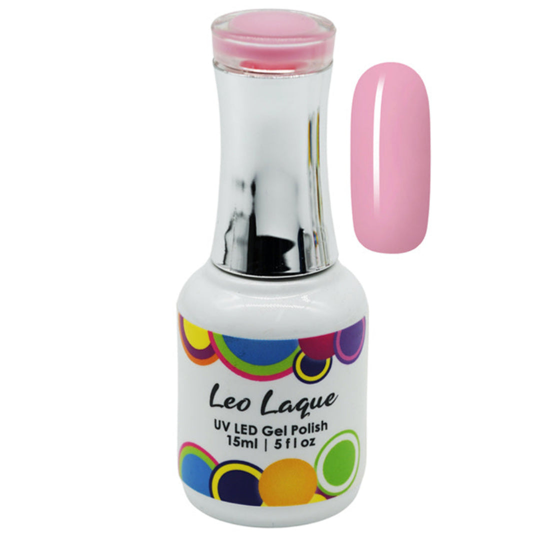 A bottle of Leo Laque UV LED Gel Polish in a light pink shade, shown alongside a vertical nail swatch displaying the same pink color. The bottle is white with a shiny silver neck and a colorful polka-dot pattern on the label.