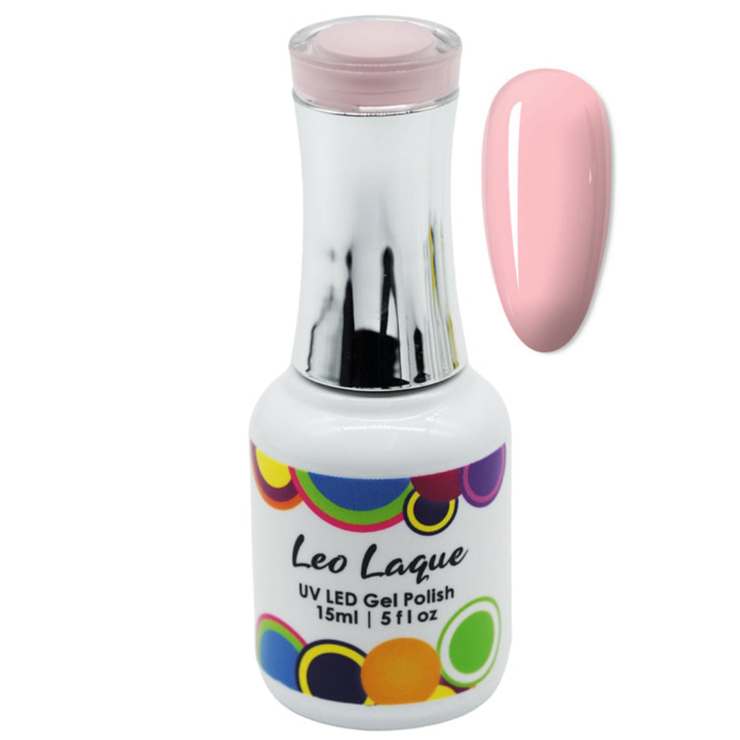 A bottle of Leo Laque UV LED Gel Polish in a light pink shade, shown alongside a matching glossy pink nail swatch on a plain white background.