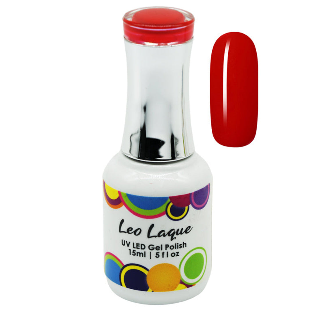 A bottle of Leo Laque UV LED gel polish with a white body, colorful circular pattern, and a red cap, shown next to a red nail swatch on a white background.