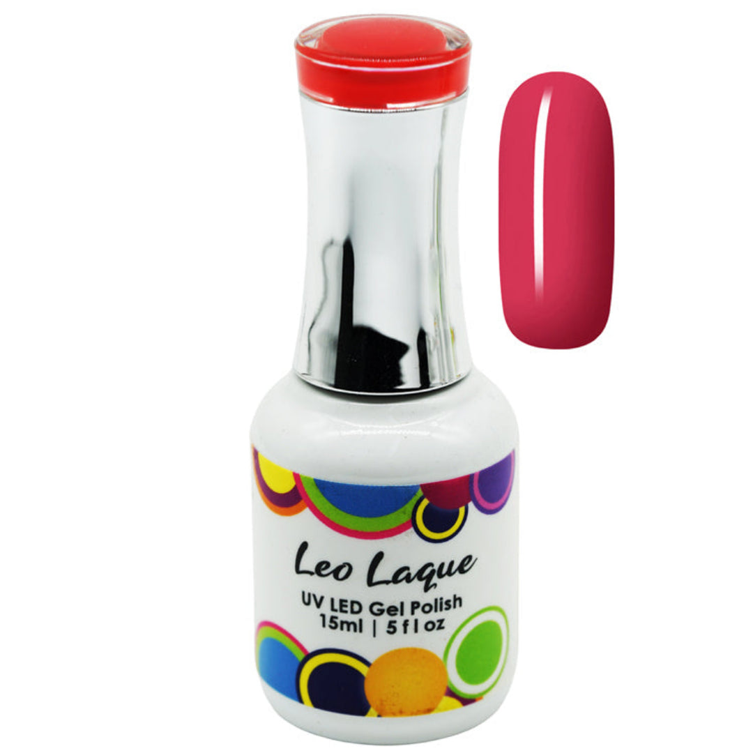 A bottle of Leo Laque UV LED gel nail polish with a white body, colorful circular pattern, and a metallic silver neck, shown next to a vertical swatch of the pinkish-red polish color.