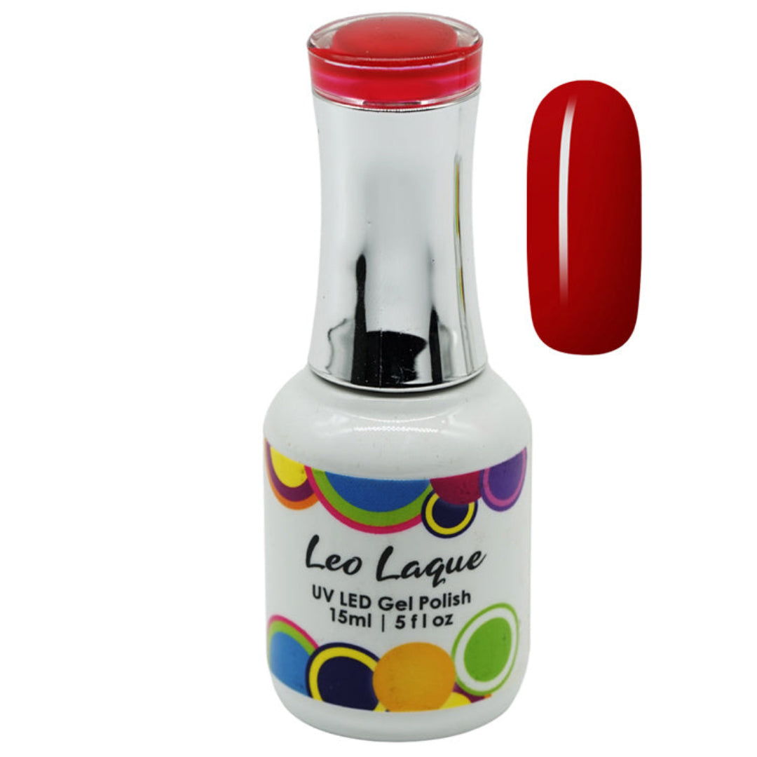 A bottle of Leo Laque UV LED Gel Polish with a white body, colorful circular pattern on the label, and a metallic silver neck, shown next to a vertical swatch of the red polish.