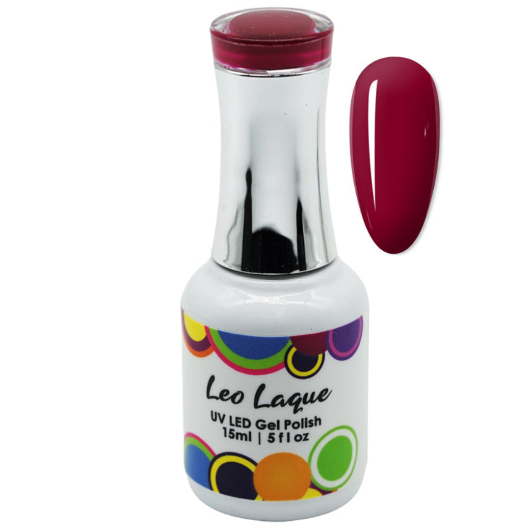 A bottle of Leo Laque UV LED gel nail polish in a deep berry red shade, shown alongside a matching glossy nail swatch on a plain white background.