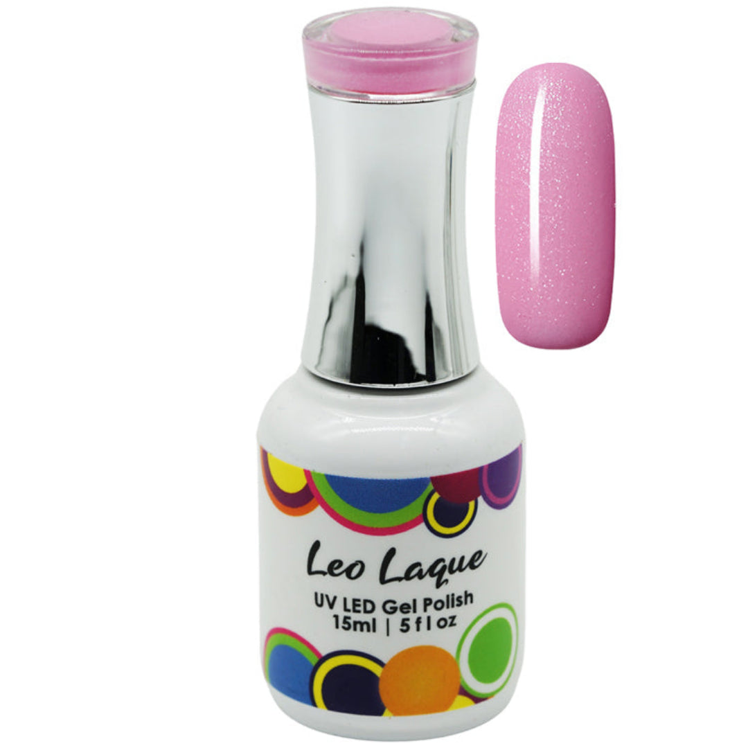 A bottle of Leo Laque UV LED Gel Polish in a sparkling light pink shade, shown next to a matching pink glitter nail swatch on a white background.