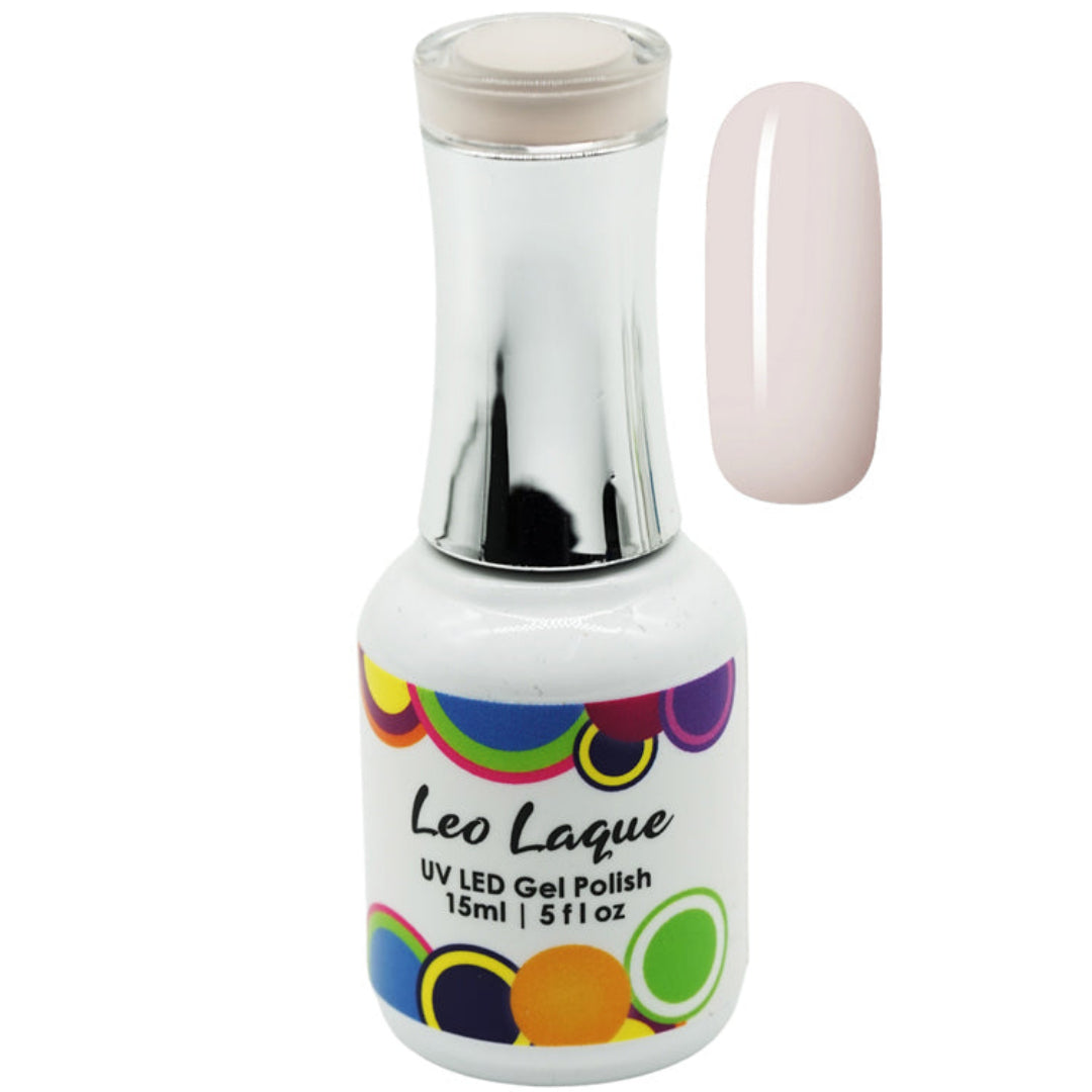 A bottle of Leo Laque UV LED gel nail polish with a white base, colorful circular pattern on the label, and a silver cap, shown next to a glossy swatch of the pale pink polish color.