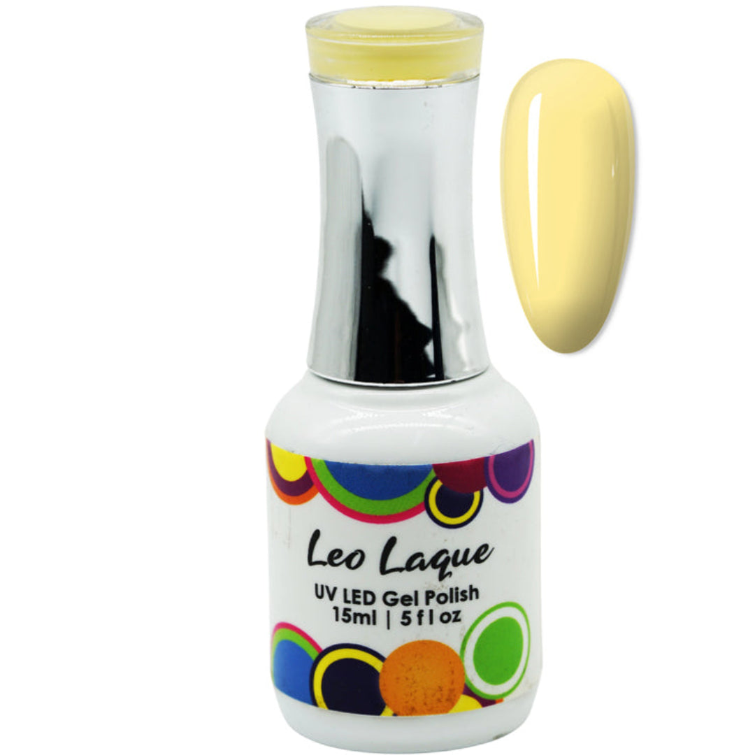 A bottle of Leo Laque UV LED Gel Polish in a pale yellow shade, shown alongside a matching yellow nail swatch on a plain white background.