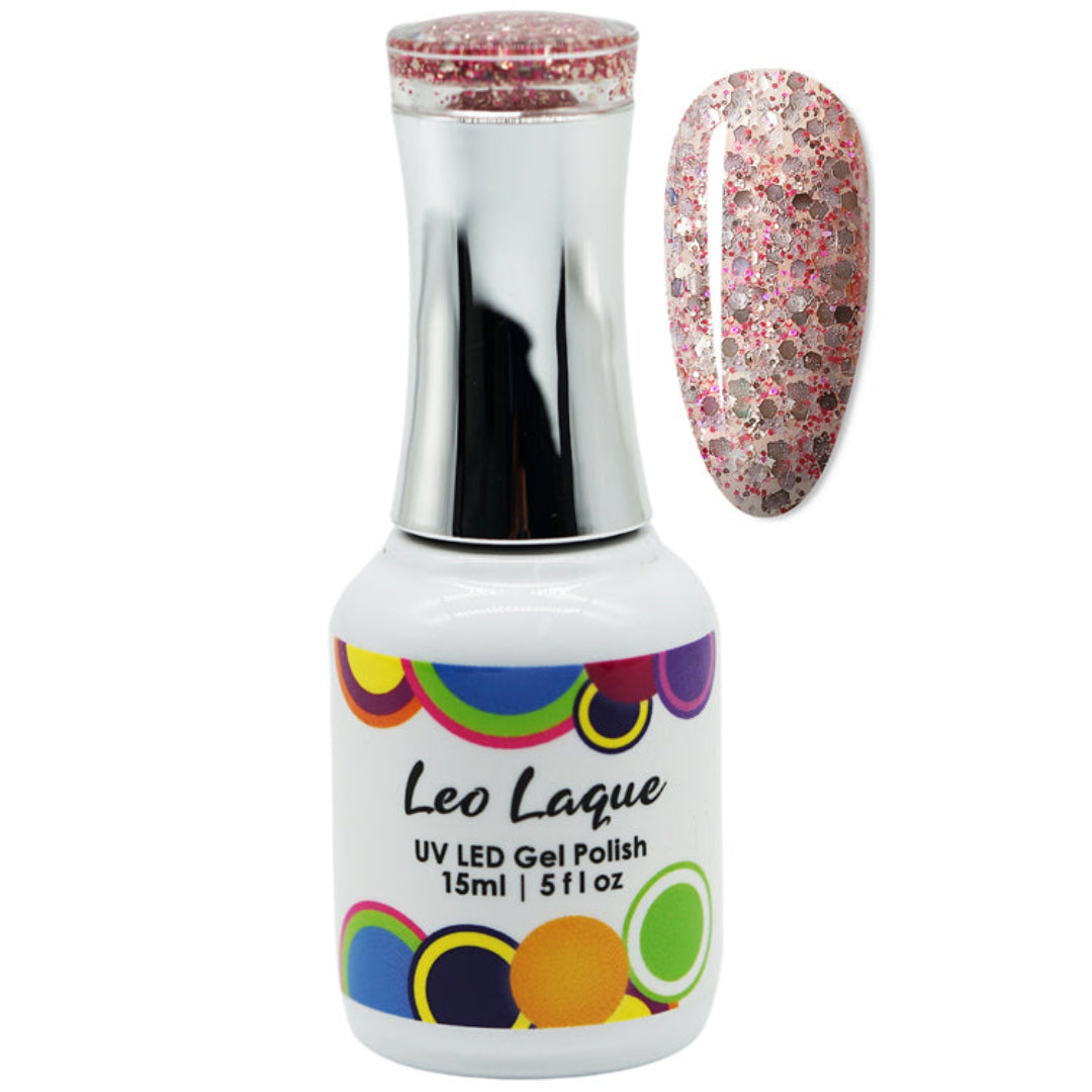 A bottle of Leo Laque UV LED gel polish with pink glitter, shown alongside a nail swatch displaying the glitter effect. The bottle has a white base, a shiny silver neck, and a colorful circle pattern on the label.