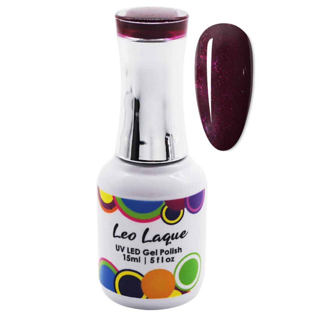 A bottle of Leo Laque UV LED gel polish with a silver cap and a color swatch showing a deep glittery plum purple shade, set against a plain white background.