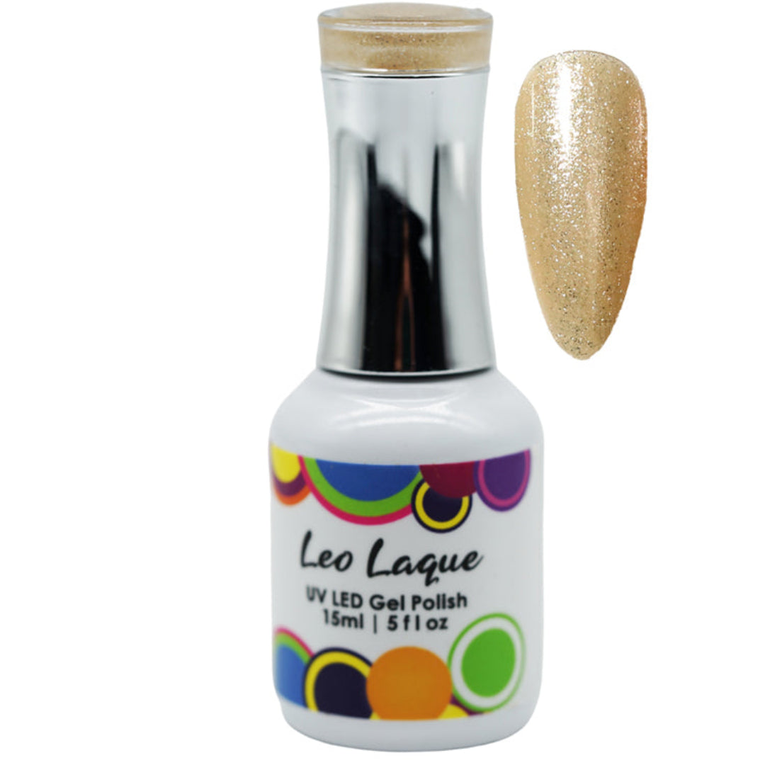 Leo Laque UV LED gel nail polish in a white bottle with a silver cap, shown next to a glittery gold swatch of the polish on a white background.