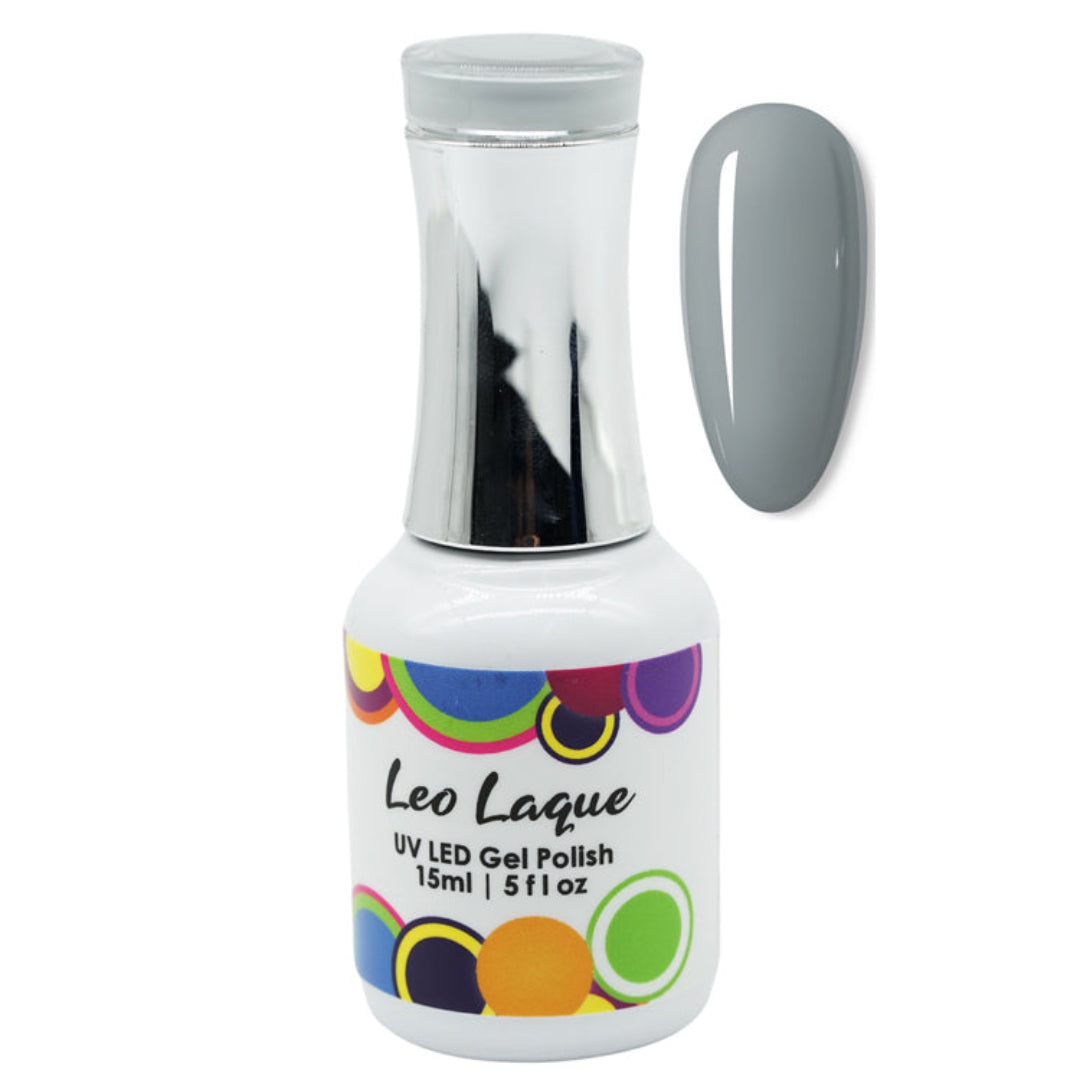 A bottle of Leo Laque UV LED Gel Polish with a silver cap and a gray nail swatch displayed next to it on a white background.