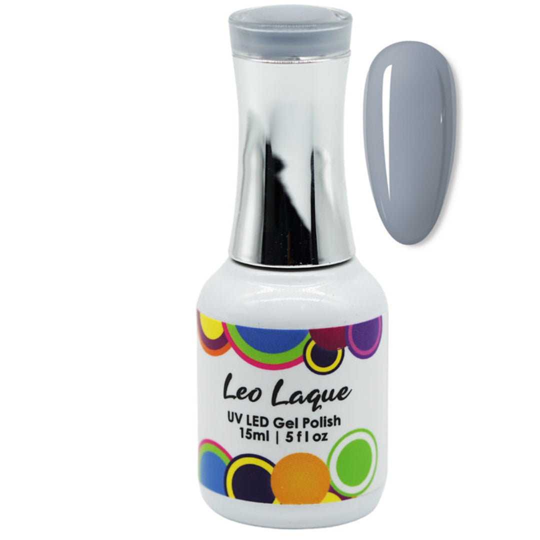 A bottle of Leo Laque UV LED gel polish in a cool gray shade, shown alongside a matching gray nail swatch on a plain white background.