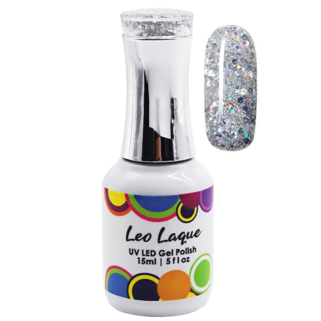 A bottle of Leo Laque UV LED gel polish with silver holographic glitter, shown alongside a nail swatch displaying the glittery silver finish.