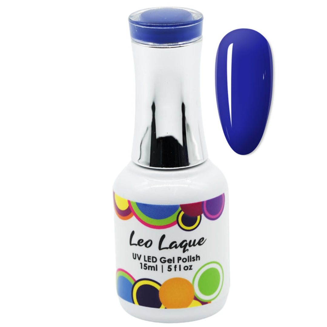 A bottle of Leo Laque UV LED Gel Polish with a white body, silver cap, and colorful circular pattern on the label, shown next to a glossy blue nail swatch on a white background.