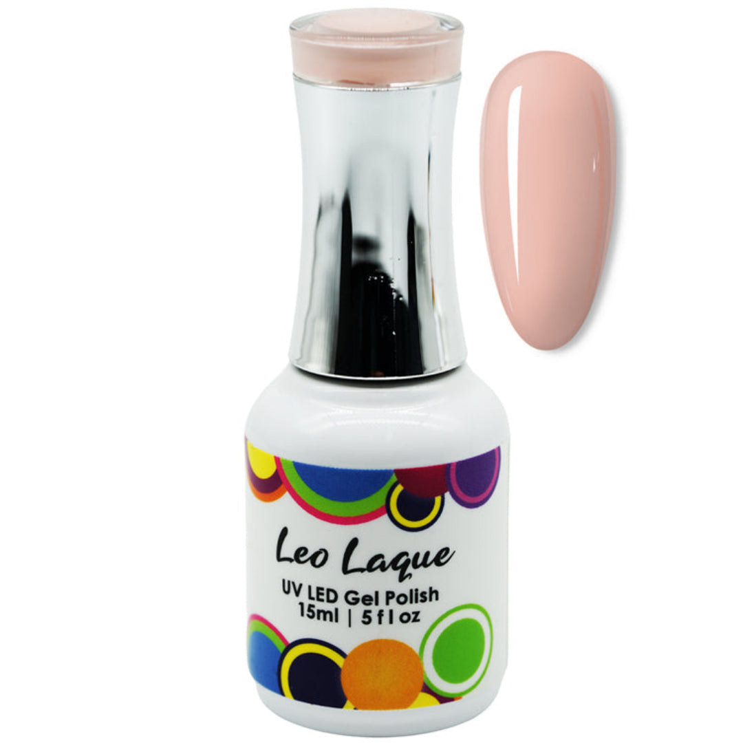 A bottle of Leo Laque UV LED Gel Polish with a metallic silver neck and a white label featuring colorful circles, shown next to a glossy swatch of the pale pink polish.