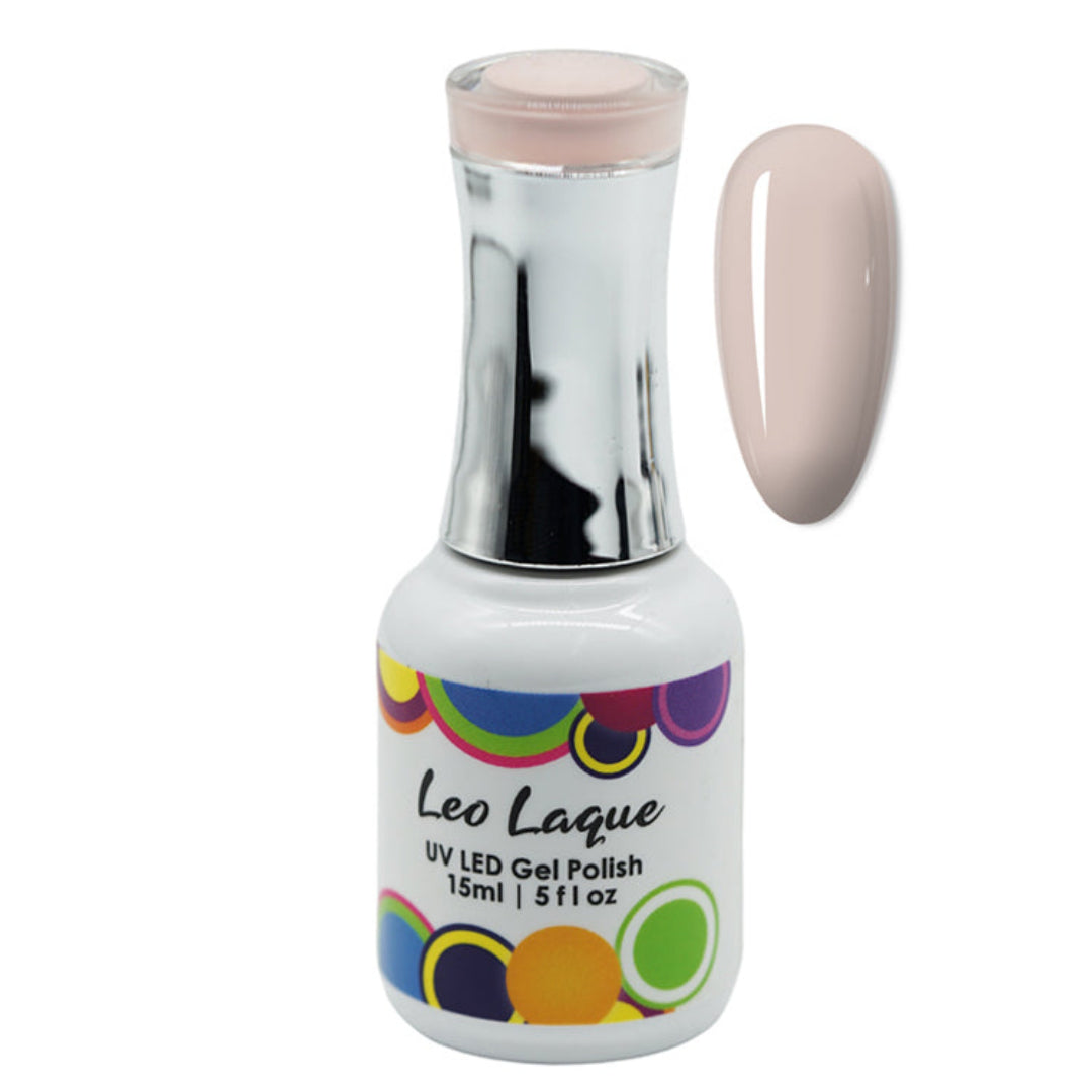 A bottle of Leo Laque UV LED Gel Polish with a metallic silver neck and a white base decorated with colorful circular patterns. A vertical oval swatch of the pale pink polish is shown next to the bottle on a plain white background.