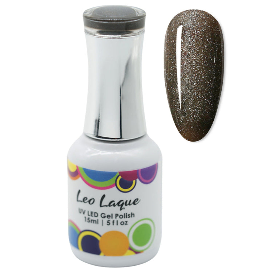A bottle of Leo Laque UV LED gel nail polish with a silver cap, shown next to a glossy nail swatch displaying a dark brown glittery color.
