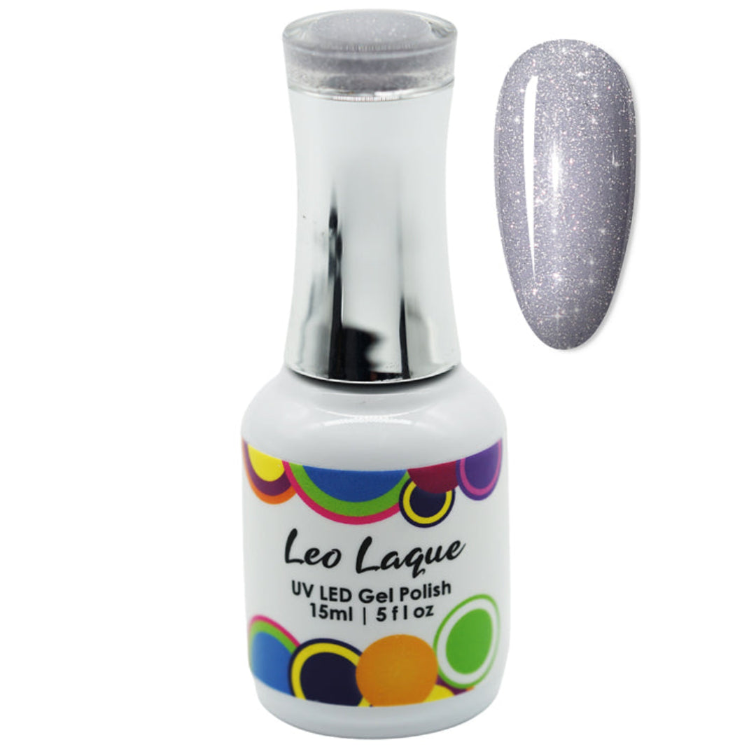 A bottle of Leo Laque UV LED Gel Polish with a silver glitter polish, shown alongside a nail swatch displaying the silver glitter finish.