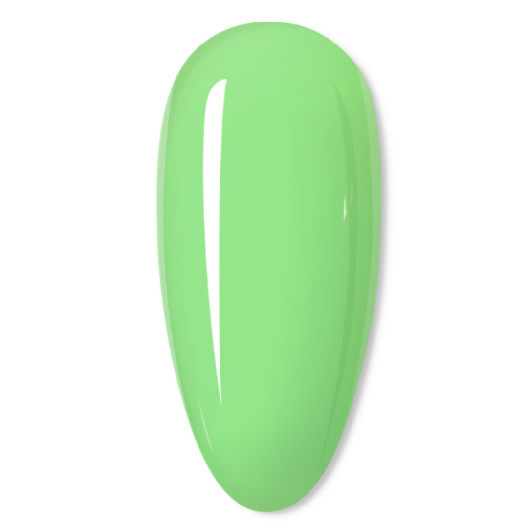 A glossy, light green nail tip swatch on a clean white background.