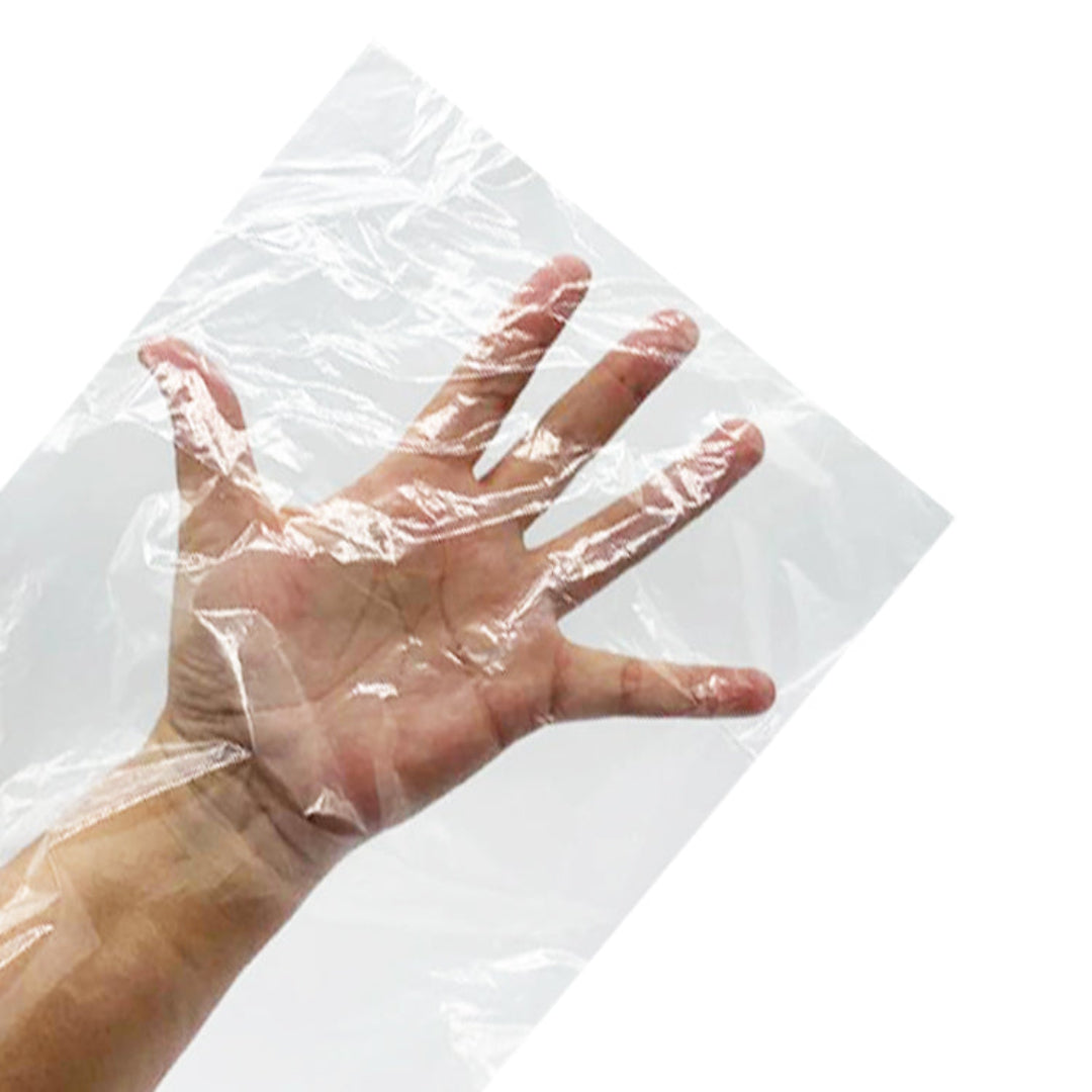 A clear plastic glove or protective cover being worn over a hand, shown against a plain white background.