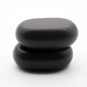 Large oval basalt massage stone which are mostly used for treatments on the back, stomach, arms, thighs, calves and back of the neck.