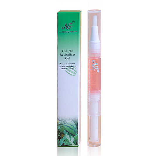 A cosmetic cuticle revitalizer oil shown next to its green and white packaging box. The clear tube contains a pinkish liquid and has a white applicator cap, with a small floral graphic on the side.